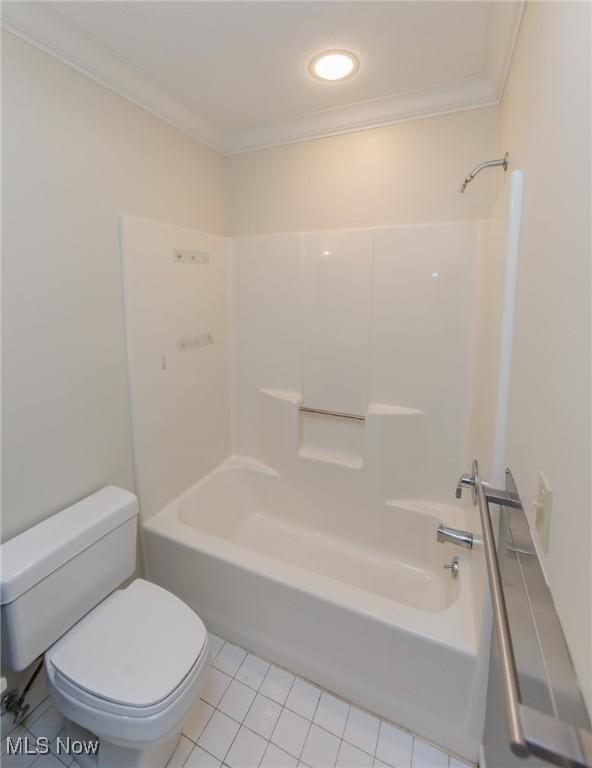 6131 Center St Unit 106, Mentor, OH 44060 - bathroom featuring ornamental molding, tile patterned flooring, and tub / shower combination