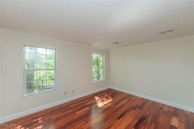 6131 Center St Unit 106, Mentor, OH 44060 - spare room with ornamental molding and dark wood-style flooring