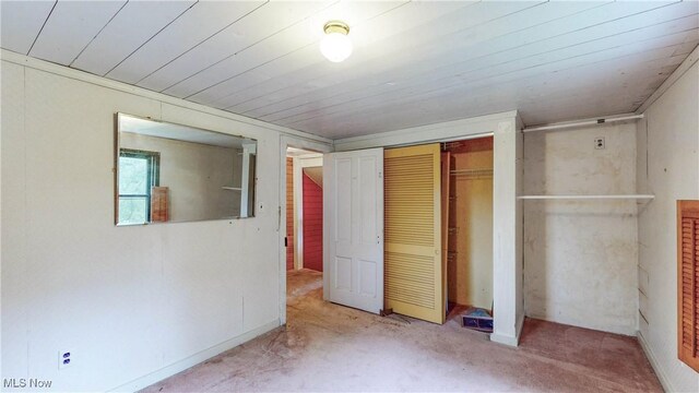 1811 Randolph Rd, Mogadore, OH 44260 - unfurnished bedroom with carpet floors and a closet