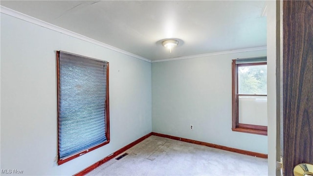 1811 Randolph Rd, Mogadore, OH 44260 - carpeted spare room with crown molding and baseboards