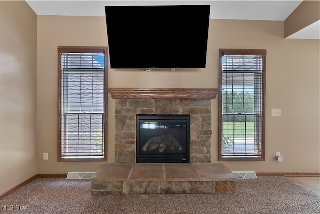 4053 Thats Life Ln, Canfield, OH 44406 - living room featuring carpet flooring and a stone fireplace
