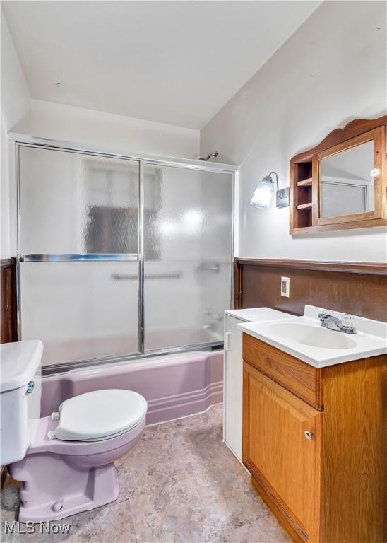 700 Alice St, East Palestine, OH 44413 - full bath featuring vanity and bath / shower combo with glass door