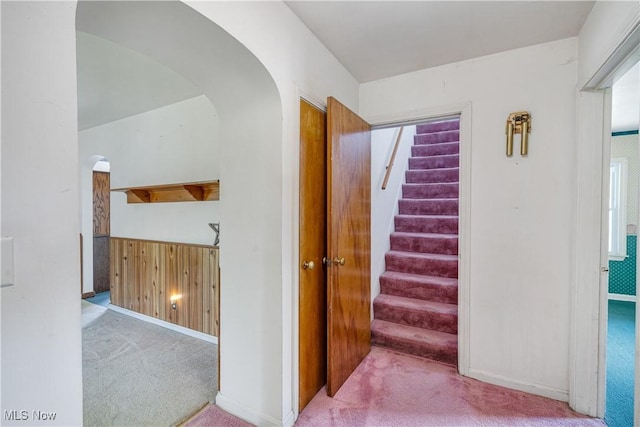 700 Alice St, East Palestine, OH 44413 - stairs with carpet floors and arched walkways