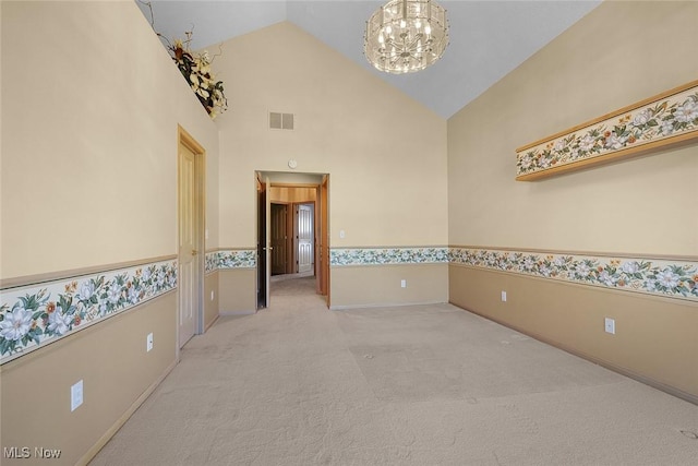 20 Golf View Ln, North Olmsted, OH 44070 - carpeted spare room with a chandelier and high vaulted ceiling