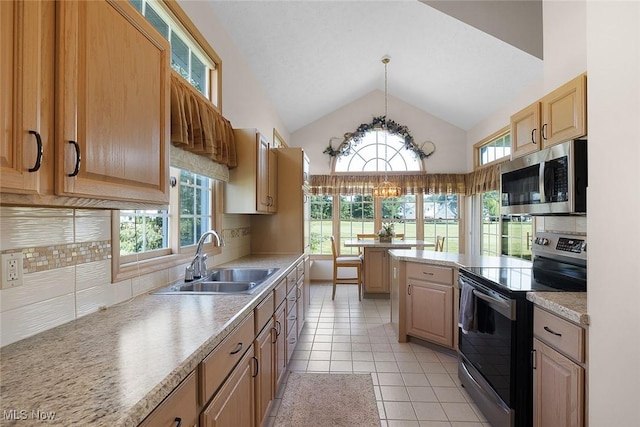 20 Golf View Ln, North Olmsted, OH 44070 - kitchen with appliances with stainless steel finishes, decorative backsplash, light countertops, light tile patterned floors, and high vaulted ceiling