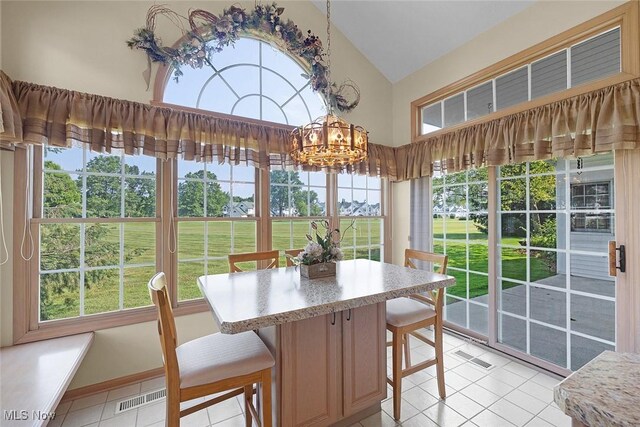 20 Golf View Ln, North Olmsted, OH 44070 - sunroom featuring a chandelier and lofted ceiling