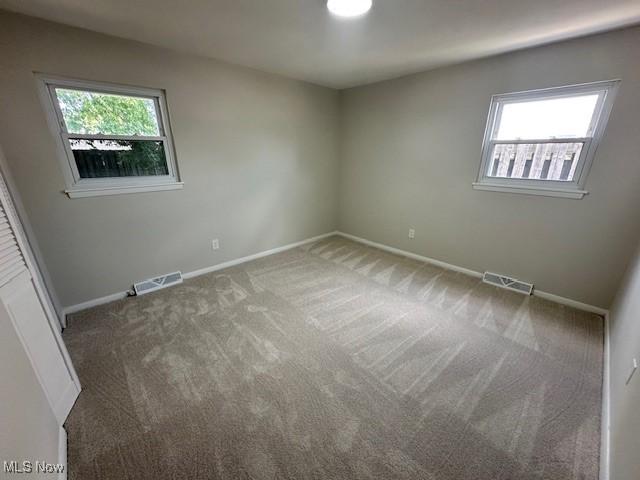 30115 Regent Rd, Wickliffe, OH 44092 - empty room featuring carpet floors and baseboards