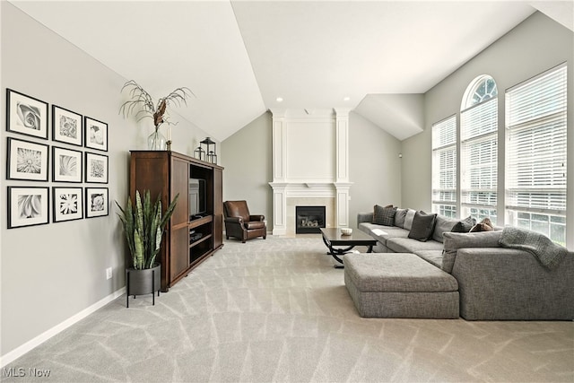 10421 Tolland Dr, Reminderville, OH 44202 - carpeted living room with lofted ceiling and a large fireplace