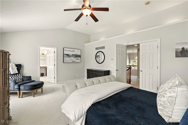 10421 Tolland Dr, Reminderville, OH 44202 - carpeted bedroom with vaulted ceiling, a ceiling fan, and ensuite bathroom