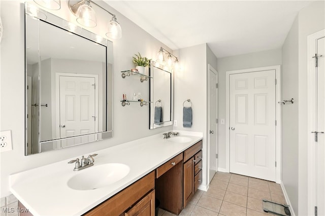 10421 Tolland Dr, Reminderville, OH 44202 - bathroom featuring double vanity and tile patterned flooring