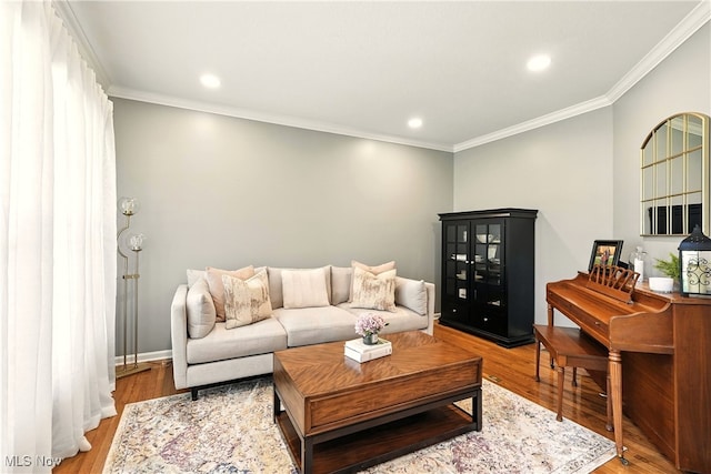 10421 Tolland Dr, Reminderville, OH 44202 - living area featuring crown molding, light wood finished floors, and recessed lighting