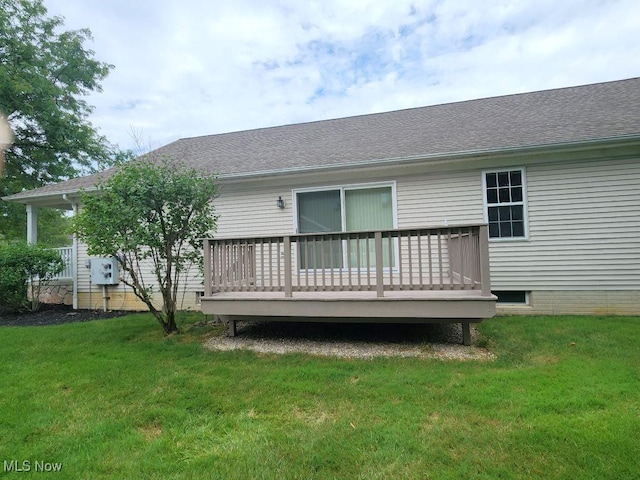 422 Dartmouth Trl, Sagamore Hills, OH 44067 - back of property featuring a wooden deck, a yard, a shingled roof, and crawl space