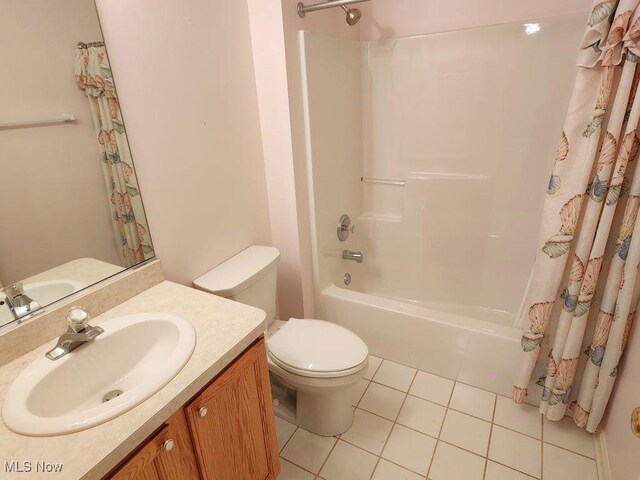 422 Dartmouth Trl, Sagamore Hills, OH 44067 - bathroom featuring shower / bath combo, tile patterned floors, and vanity