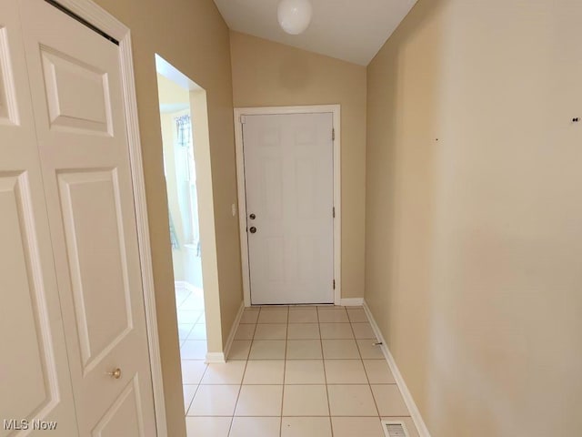 422 Dartmouth Trl, Sagamore Hills, OH 44067 - corridor with light tile patterned floors and vaulted ceiling