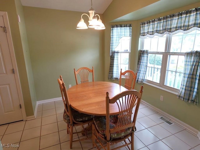 422 Dartmouth Trl, Sagamore Hills, OH 44067 - dining space featuring a chandelier and light tile patterned floors