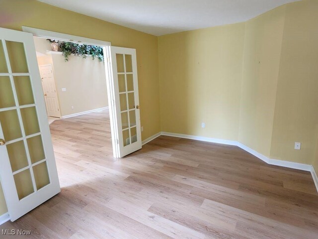422 Dartmouth Trl, Sagamore Hills, OH 44067 - empty room featuring french doors and wood finished floors