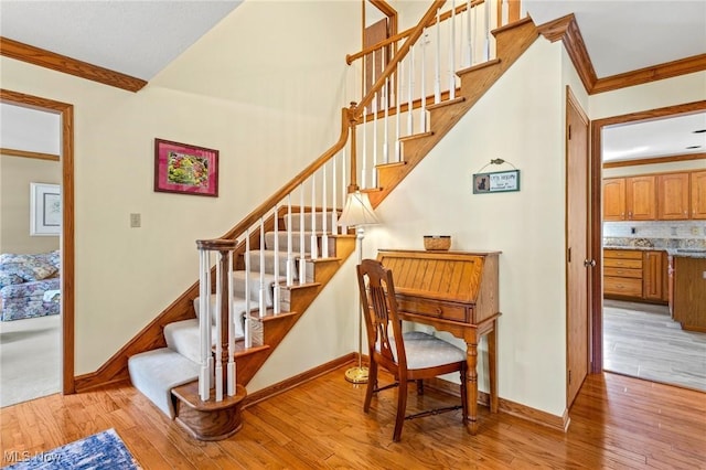 302 Brookpoint Cir, Wadsworth, OH 44281 - stairway with wood-type flooring and ornamental molding