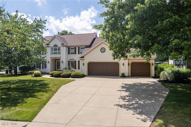 302 Brookpoint Cir, Wadsworth, OH 44281 - view of front of home with a garage, driveway, and a front lawn