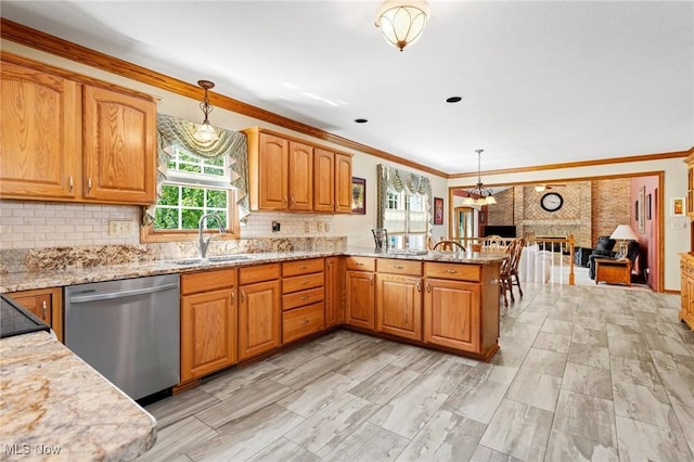302 Brookpoint Cir, Wadsworth, OH 44281 - kitchen with dishwasher, light stone countertops, a peninsula, hanging light fixtures, and crown molding