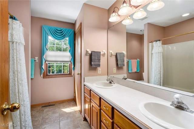302 Brookpoint Cir, Wadsworth, OH 44281 - bathroom with double vanity, tile patterned floors, and a shower with curtain