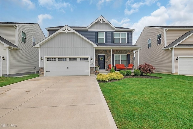 37282 Amber Way N, Ridgeville, OH 44039 - craftsman inspired home with board and batten siding, covered porch, driveway, and stone siding