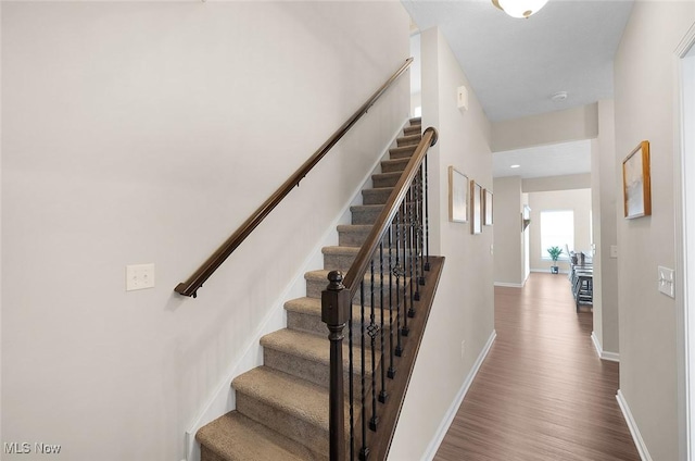 37282 Amber Way N, Ridgeville, OH 44039 - stairway with wood finished floors and baseboards