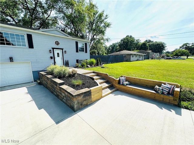 4235 Patricia Ave, Austintown, OH 44511 - view of front facade with concrete driveway and a garage