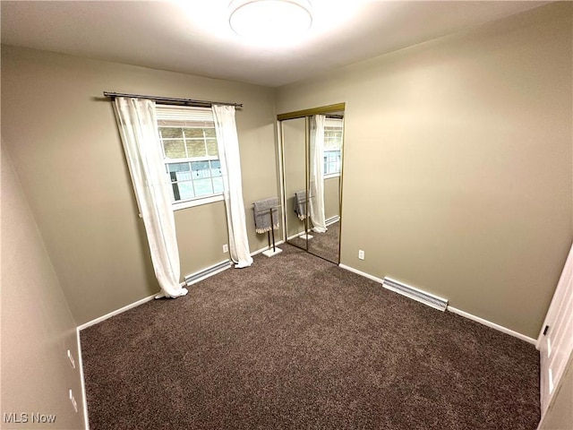 4235 Patricia Ave, Austintown, OH 44511 - unfurnished bedroom with dark colored carpet and a closet