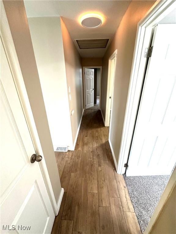 4235 Patricia Ave, Austintown, OH 44511 - hallway featuring dark wood-style flooring and baseboards