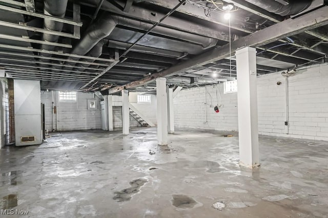 5902 Vandalia Ave, Cleveland, OH 44144 - basement featuring stairway and heating unit