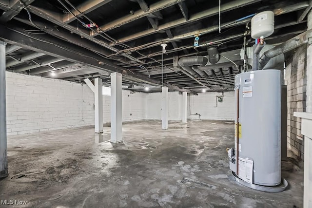 5902 Vandalia Ave, Cleveland, OH 44144 - unfinished below grade area featuring water heater