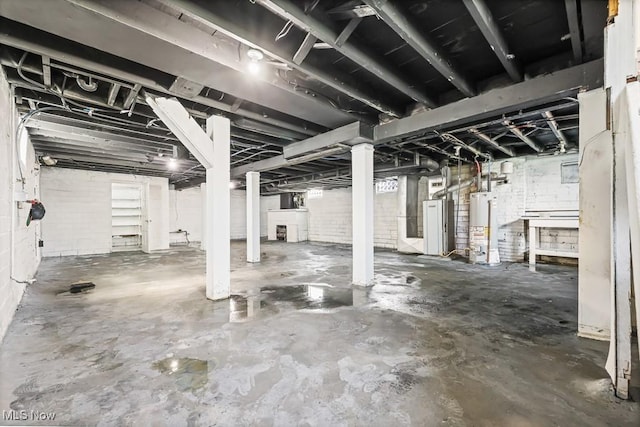 5902 Vandalia Ave, Cleveland, OH 44144 - unfinished basement featuring water heater
