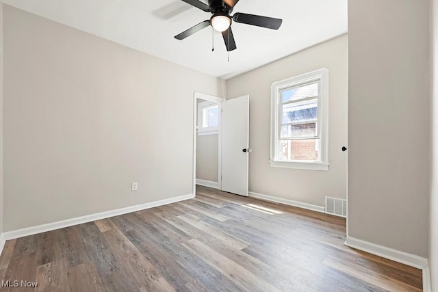 5902 Vandalia Ave, Cleveland, OH 44144 - unfurnished room featuring wood finished floors and a ceiling fan