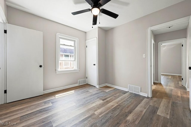 5902 Vandalia Ave, Cleveland, OH 44144 - unfurnished bedroom featuring wood finished floors and a ceiling fan