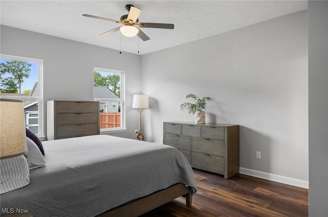 13176 Barrington Dr, Grafton, OH 44044 - bedroom with dark wood-style floors and a ceiling fan