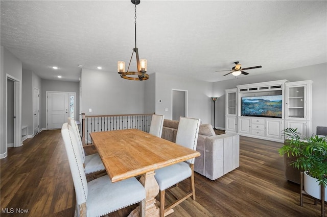 13176 Barrington Dr, Grafton, OH 44044 - dining space with dark wood-style flooring, a ceiling fan, a chandelier, recessed lighting, and a textured ceiling