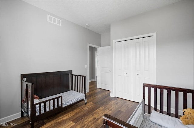 13176 Barrington Dr, Grafton, OH 44044 - bedroom featuring wood finished floors and a closet
