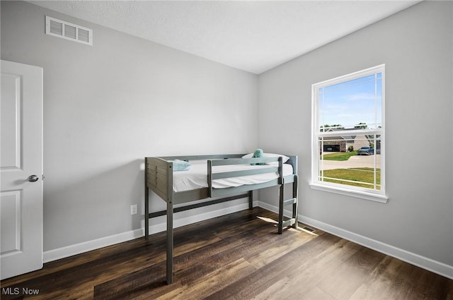 13176 Barrington Dr, Grafton, OH 44044 - bedroom featuring wood finished floors and baseboards