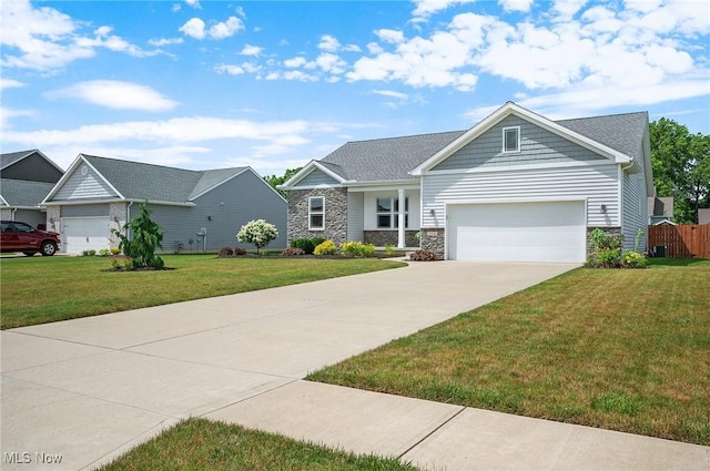 13176 Barrington Dr, Grafton, OH 44044 - craftsman-style home featuring stone siding, driveway, and a garage
