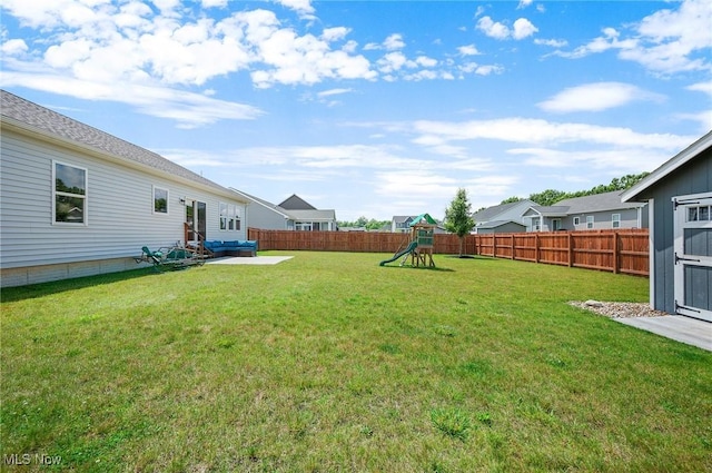 13176 Barrington Dr, Grafton, OH 44044 - fenced backyard featuring a playground