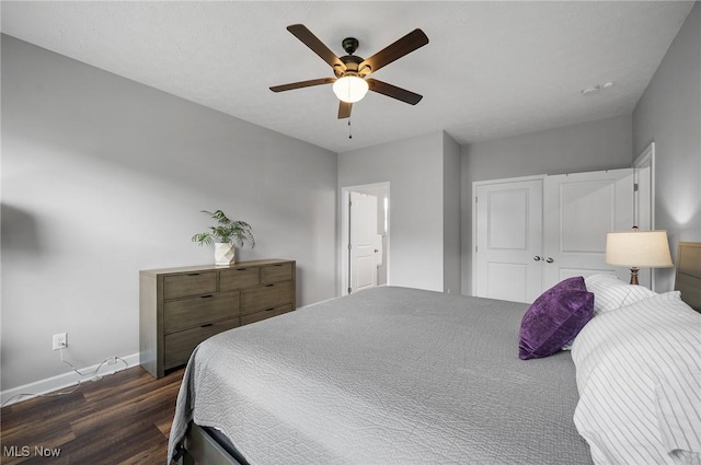 13176 Barrington Dr, Grafton, OH 44044 - bedroom featuring dark wood-style flooring, a closet, and a ceiling fan