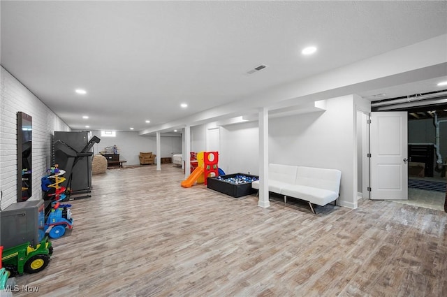 13176 Barrington Dr, Grafton, OH 44044 - rec room featuring wood finished floors and recessed lighting