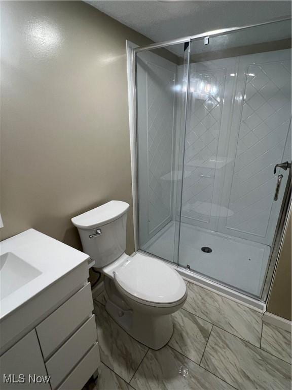 1820 E 47th St, Ashtabula, OH 44004 - bathroom featuring vanity, a shower stall, and marble finish flooring