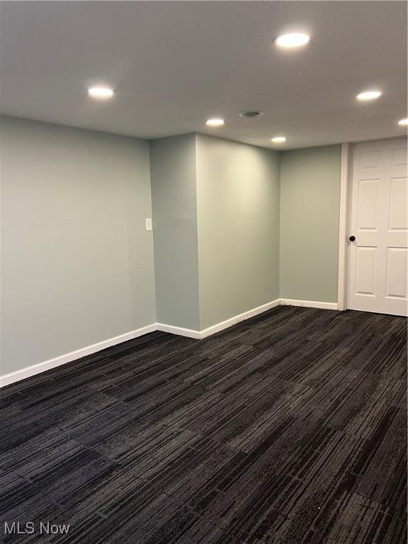 1820 E 47th St, Ashtabula, OH 44004 - empty room featuring recessed lighting and dark wood-type flooring