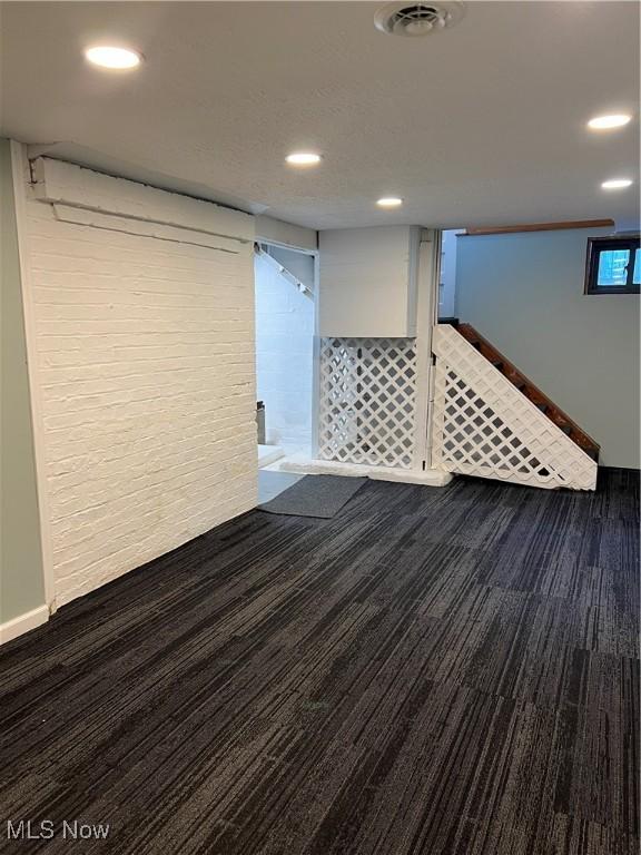 1820 E 47th St, Ashtabula, OH 44004 - finished basement featuring wood finished floors, recessed lighting, and stairs