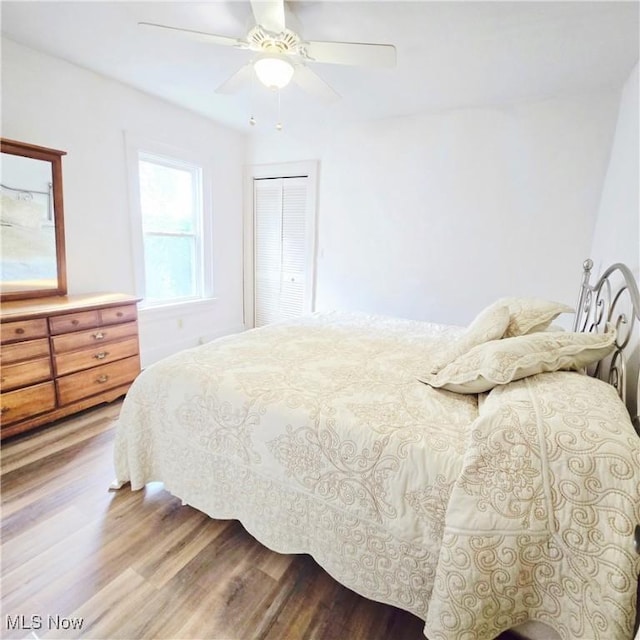 3303 Hemlock St, Parkersburg, WV 26101 - bedroom featuring light wood-type flooring, a closet, and ceiling fan