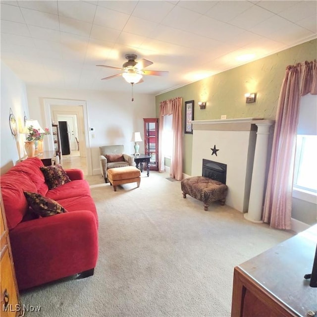 3303 Hemlock St, Parkersburg, WV 26101 - living area featuring ceiling fan, carpet, and a fireplace