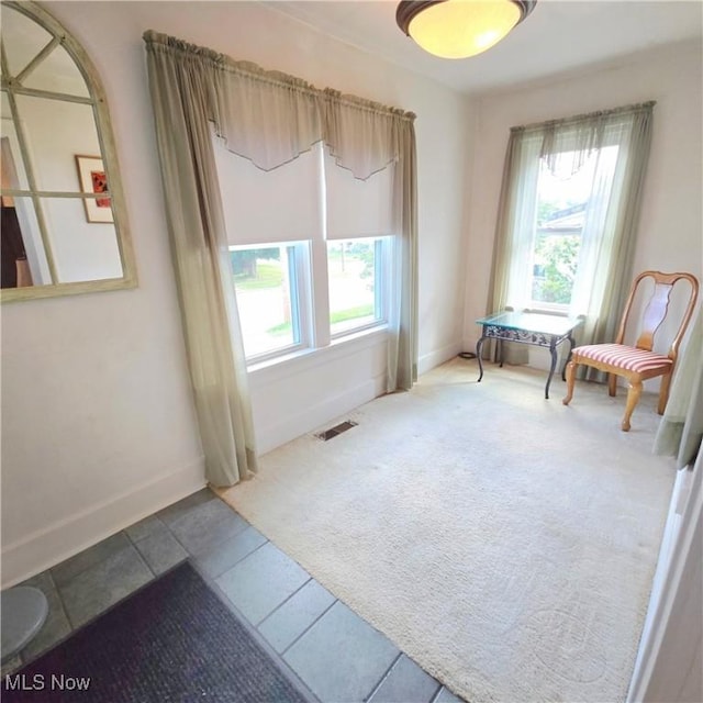 3303 Hemlock St, Parkersburg, WV 26101 - sitting room featuring healthy amount of natural light and tile patterned floors