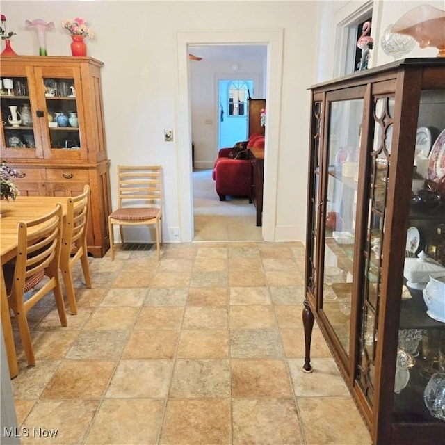 3303 Hemlock St, Parkersburg, WV 26101 - dining area featuring stone finish flooring and baseboards