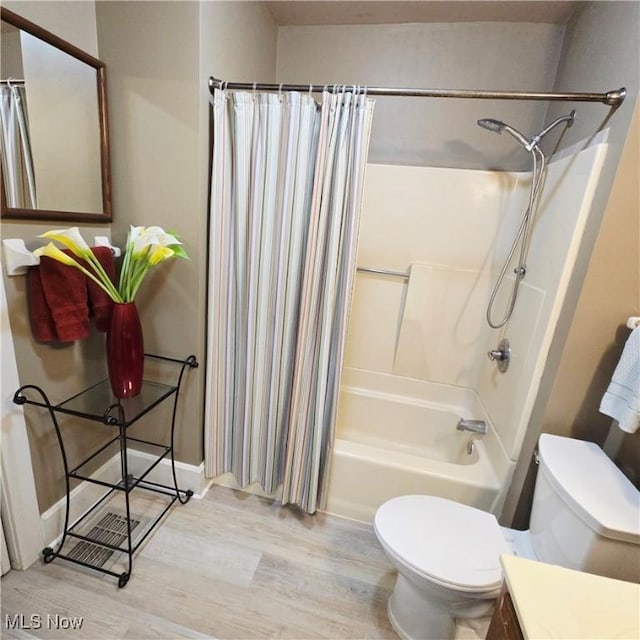 3303 Hemlock St, Parkersburg, WV 26101 - bathroom featuring wood finished floors, vanity, and shower / tub combo